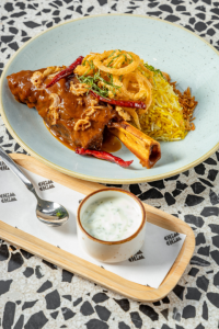 Biryani Lamb Shank Bowl: Fragrant Biryani Rice, Slow-cooked lamb Shank Dtew,