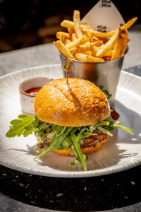 Mushroom Burger: Roasted peppers, Emmentaler cheese, arugula, basil aioli, sesame seed brioche bun